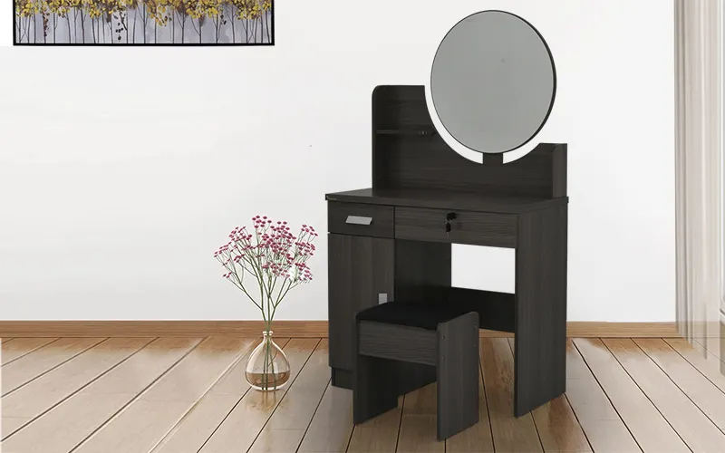 A black dressing table with a mirror and stool